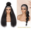 A model displays a long straight black wig with a leopard print headband and large hoop earrings.