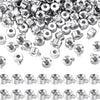 A collection of silver jewelry findings stoppers and spacers for connectors.