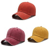 Two casual baseball caps, one in burnt orange and one in mustard yellow.