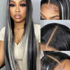 A woman models a long straight lace front wig with black and white highlights