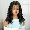 A model wears a long black box braid wig with light makeup against a white background.