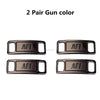 Two pairs of gun color diamond shoe charms and laces