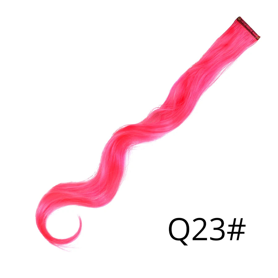 A vibrant pink, long, wavy synthetic hair extension is shown extending diagonally across the frame.