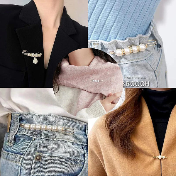 Close-up of elegant pearl brooch pins worn on a black blazer, denim jeans, and a beige sweater.