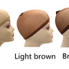 A row of five models wearing different colored stretch mesh wig nets or caps: beige, skin, light brown, brown, and black.