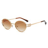 Goldfarbene Retro-Ovale Sonnenbrille mit braunen Scharnierenden und einer strukturierten Brücke