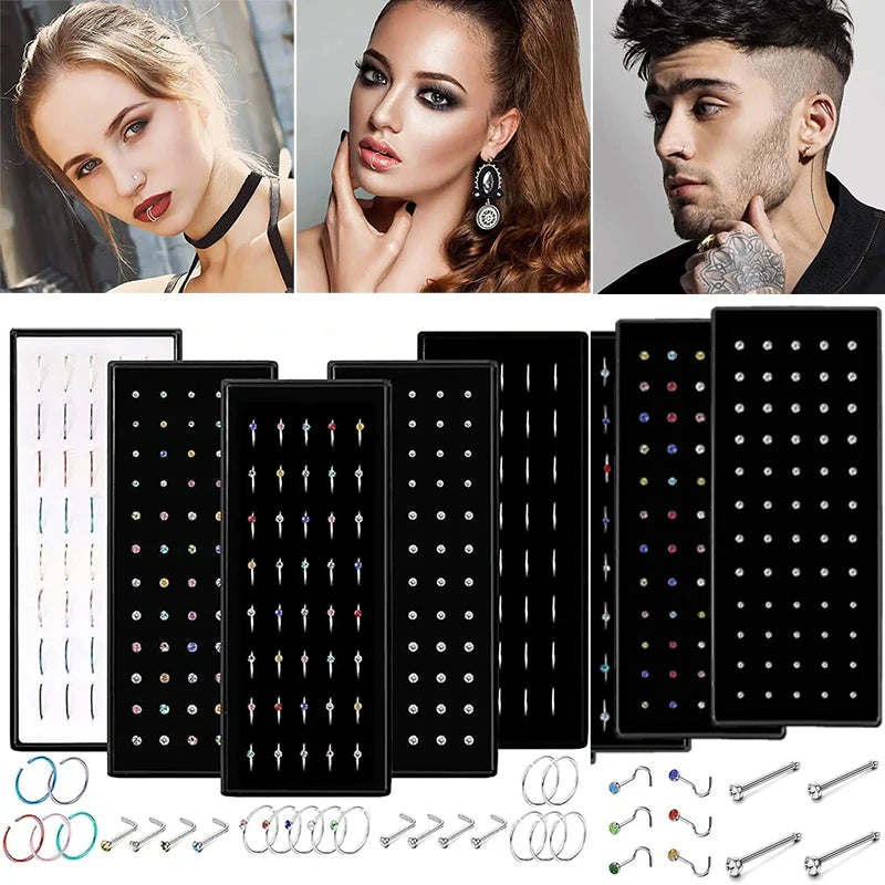 Stainless steel nose stud set for body piercing featuring various colored and shaped studs.