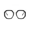 A pair of black anti-blue light eyeglasses frames with thin temples.