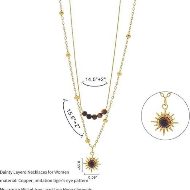 Gold layered necklace featuring a tiger's eye sunflower pendant