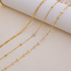 Gold-toned handmade crystal cross anklets set displayed on a light background.