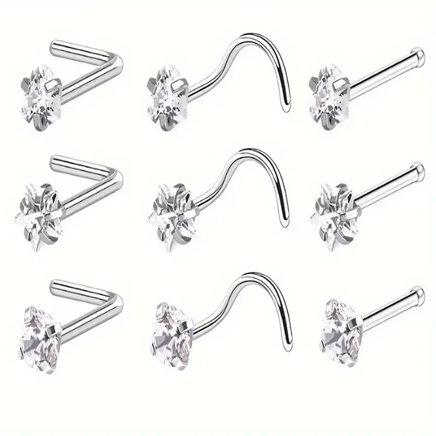 Three pairs of heart star zirconia nostril stud earrings shown in various angles
