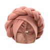 A soft dusty rose braided turban cap for African party headwear