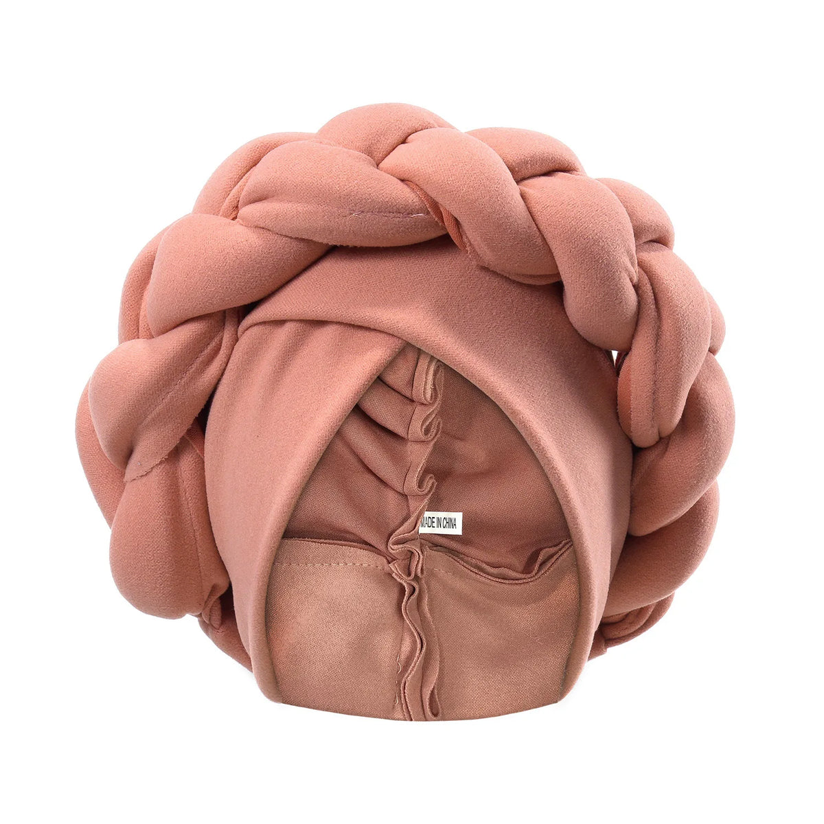 A soft dusty rose braided turban cap for African party headwear