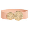 A light peach colored elastic waist belt featuring two round gold metallic embellishments.