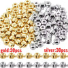 A collection of gold and silver jewelry findings stoppers or spacers for connectors.