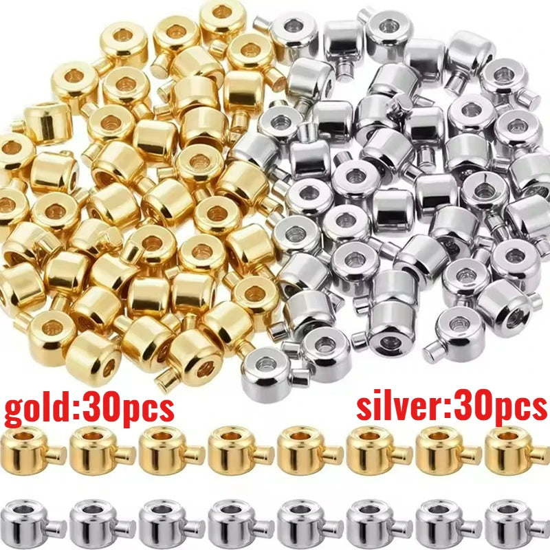 A collection of gold and silver jewelry findings stoppers or spacers for connectors.