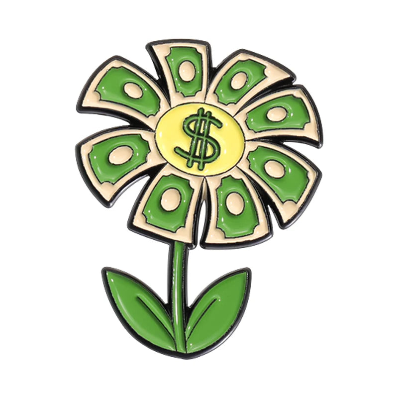 A yellow enamel flower brooch featuring green petals and a dollar sign center on a white background.