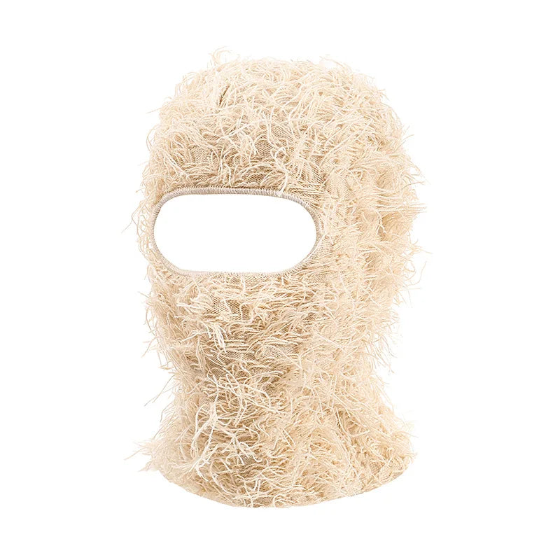 Bonnet balaclava en tricot camouflage délavé beige avec un œilletté.