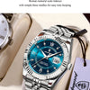 Montre-bracelet argentée avec cadran bleu et index en diamant sur fond clair.