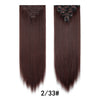 A pair of dark brown, straight hair extensions shown against a white background.