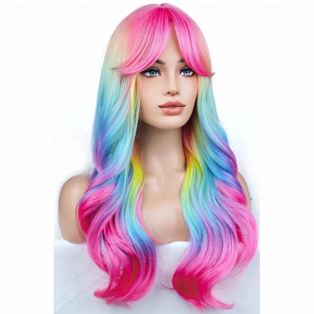 A woman modeling a long, multi-colored rainbow ombre wig with bangs in pink, blue, and green hues.