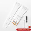 White silicone watch band with a metal buckle and a separate pin for replacement