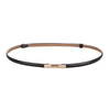 A skinny leather belt with a tan and black color combination featuring an adjustable gold buckle.