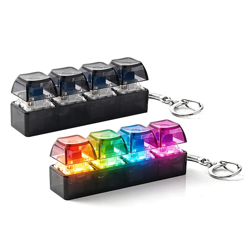 A black LED fidget keychain keyboard with multiple colored light-up buttons and attached to a silver keyring.