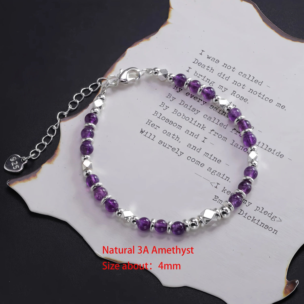 Sterling silver double heart charm bracelet featuring natural amethyst stones
