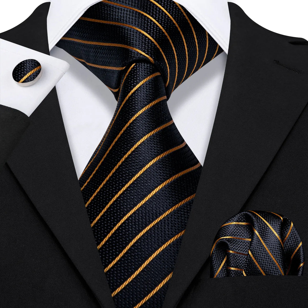 A black silk jacquard tie with gold stripes and a matching black silk bow tie displayed against a white shirt and black jacke