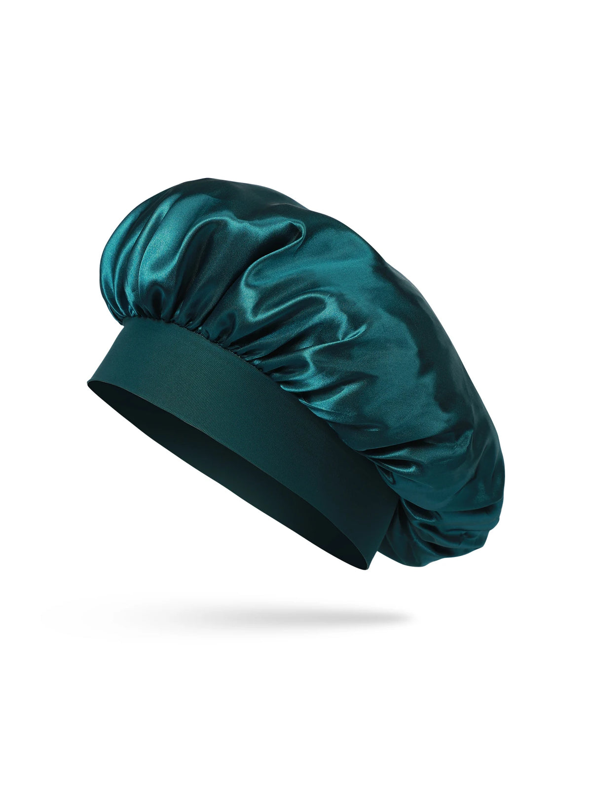 Bonnet pour cheveux en soie satinée bleu sarcelle foncé plié et exposé sur fond blanc.