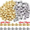 A collection of gold and silver jewelry findings stoppers or spacers for connectors.