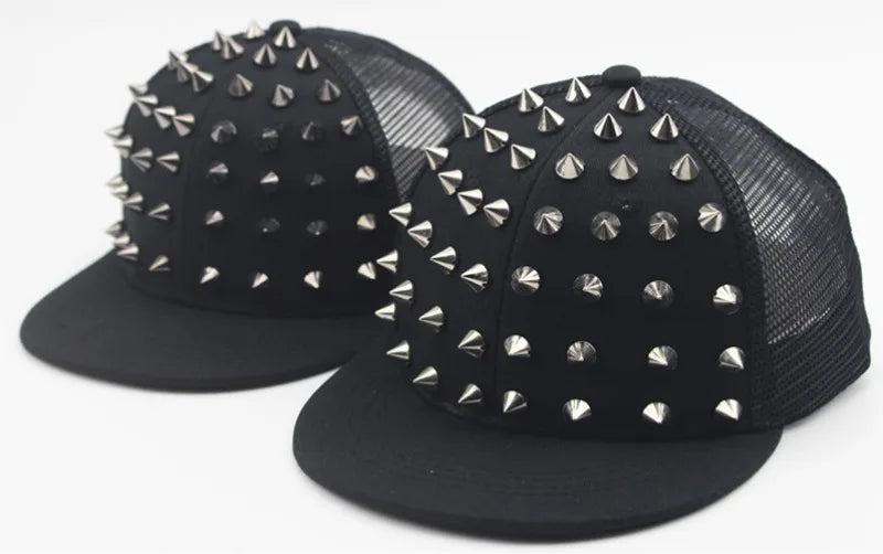 Black flat hat baseball cap adorned with silver rivets and studs.