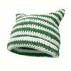 A knitted beanie hat with striped green and white yarn, resembling cat ears.