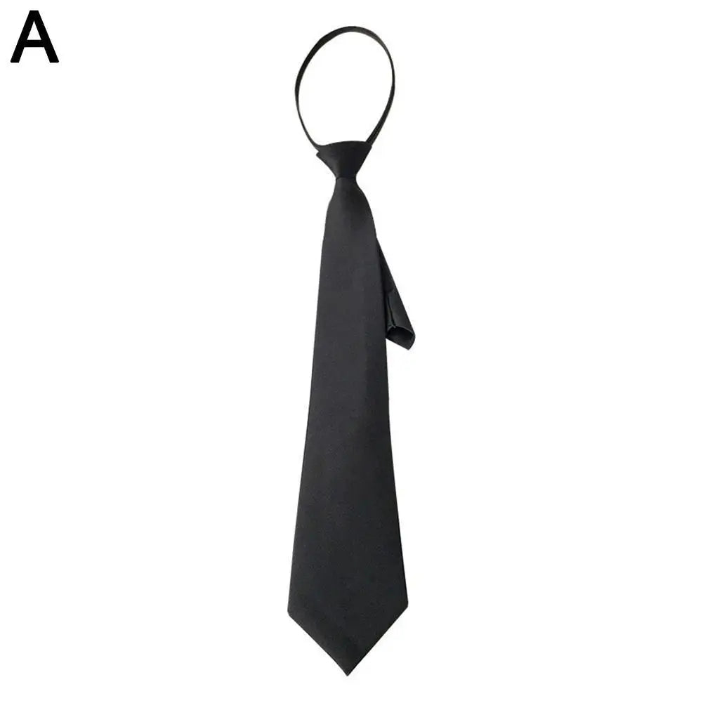 A black clip-on tie is shown against a white background.