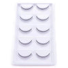 A white tray holding a set of dramatic mink false eyelashes.