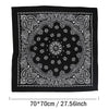 Black bandana scarf featuring intricate white paisley and floral patterns on a black background
