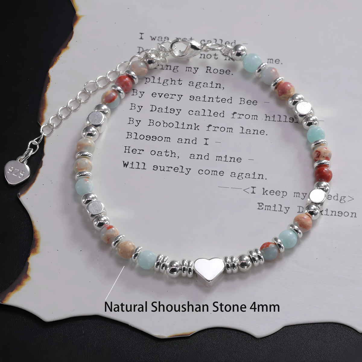 Sterling silver double heart charm bracelet featuring natural shoushan stone beads in pink and blue tones