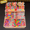 A tiered box of colorful butterfly hair accessories featuring various pink, purple, and blue plastic shapes.