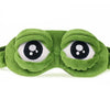 A green soft cotton sleep mask designed to relieve eye strain, featuring large, rounded eyes.