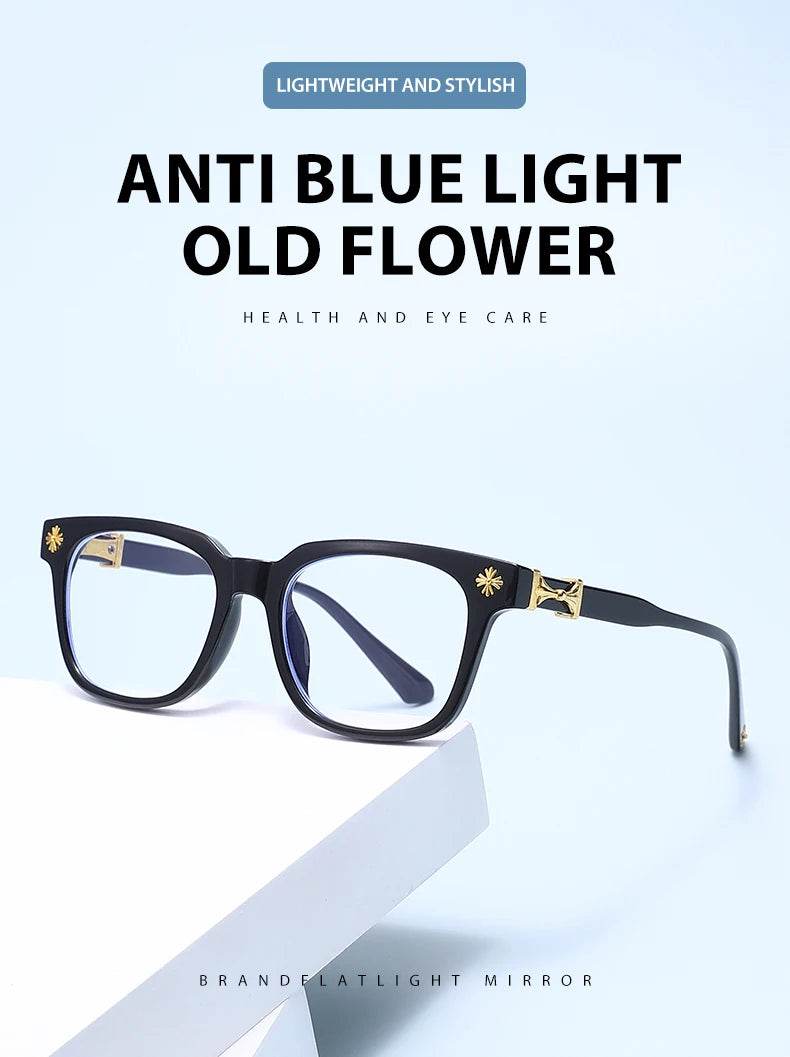 Black square anti blue light eyeglasses resting on a white surface.