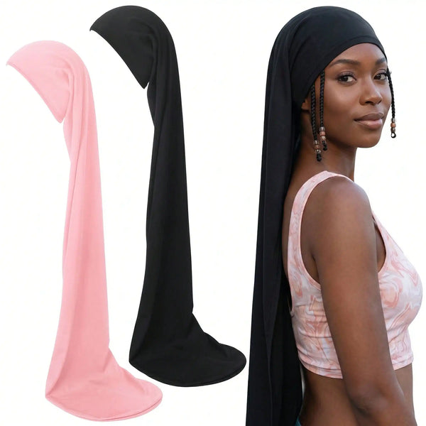 A black soft knit hair wrap shown alongside a pink version and a model wearing the head covering.