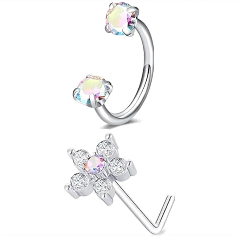 A set of silver horseshoe nose rings featuring clear and iridescent gemstone studs.