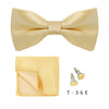 A light yellow men's bow tie and cufflinks set displayed on a white background.