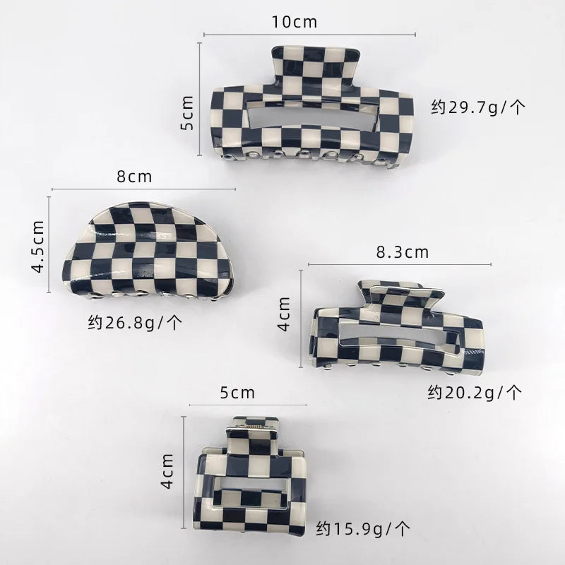 A collection of black and white checkered rectangle hair claw clips shown with various dimensions.