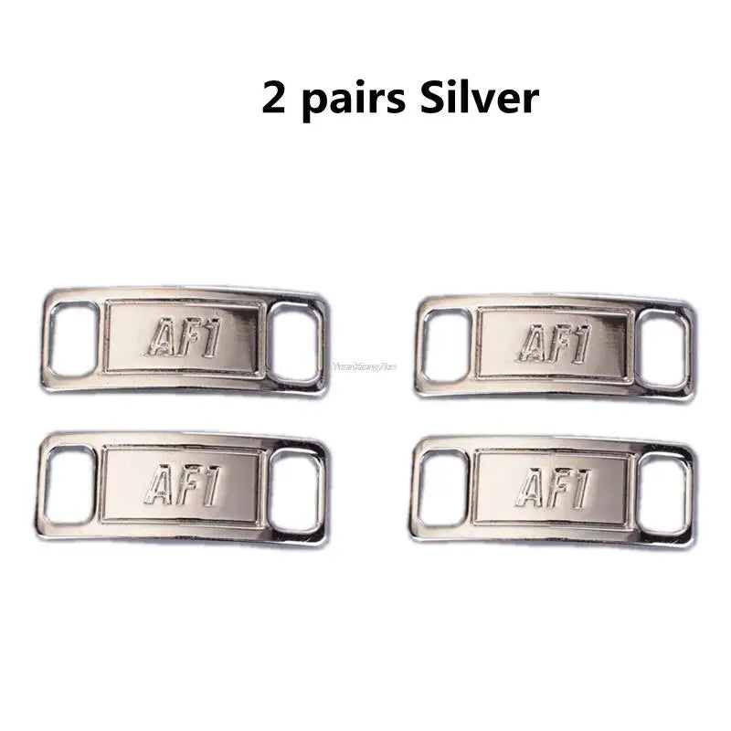 Two pairs of silver AF1 diamond shoe charms and laces