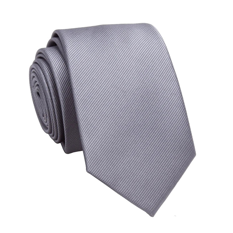A folded gray men's slim jacquard business tie.