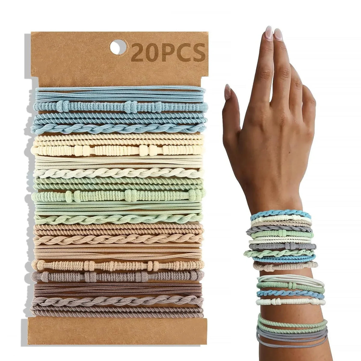 A collection of beige, green, and brown boho hair ties and headbands packaged in a kraft paper box.