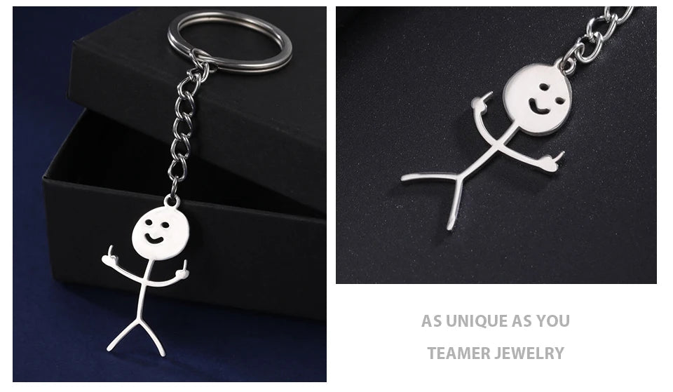 Silver keychain featuring a white stickman with a middle finger gesture on a black background