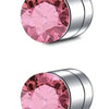 A close-up view of a pink rose-cut magnetic nose stud earring with a silver finish.